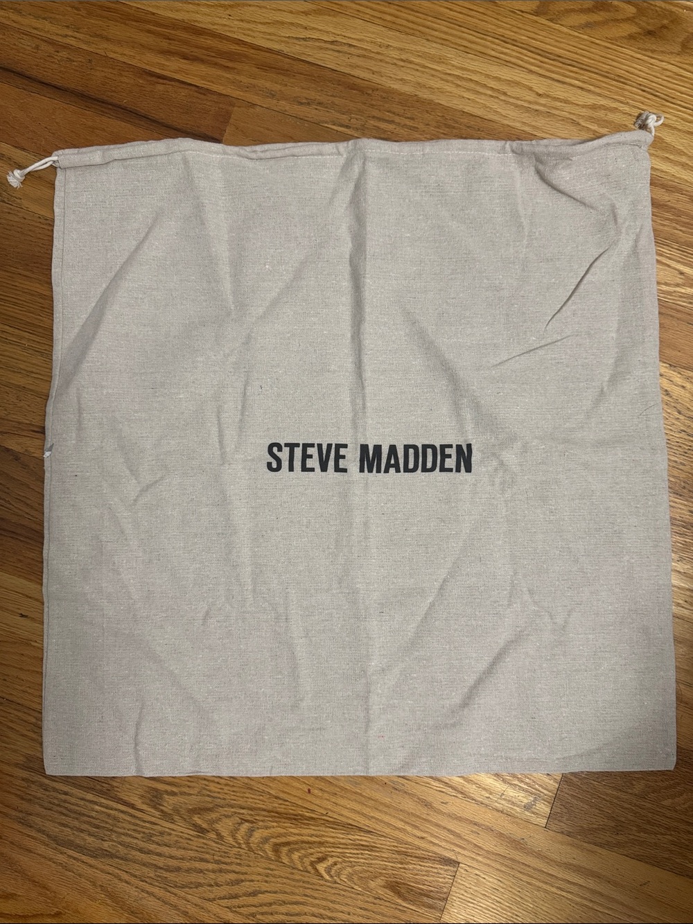 Steve Madden Drawstring Dust Bag in Light Beige with Black Logo